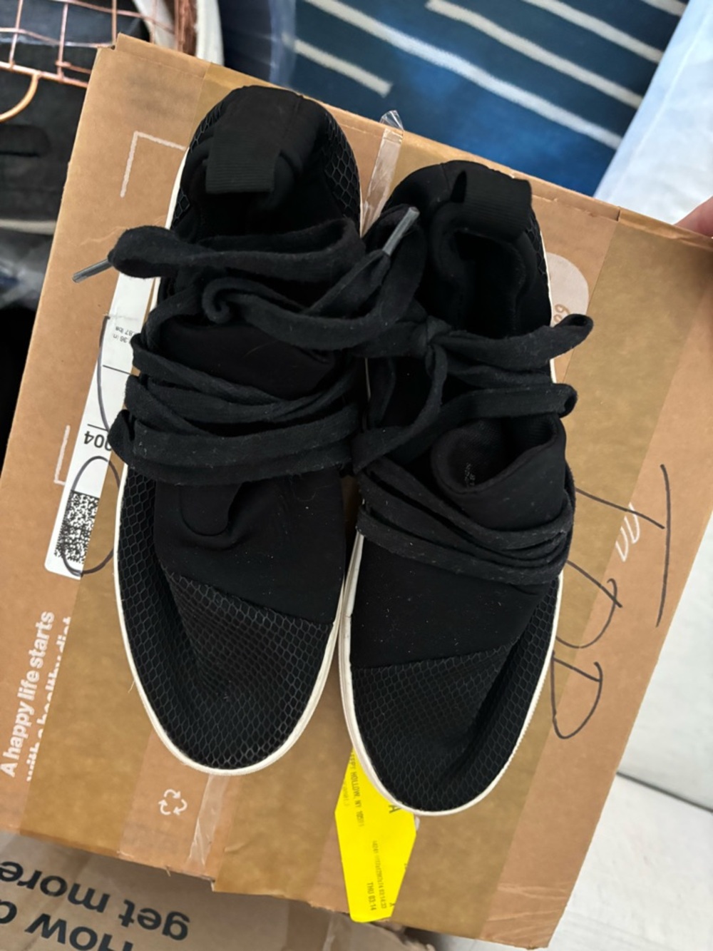 Steve Madden Black Slip-On Knit Sneakers with White Soles